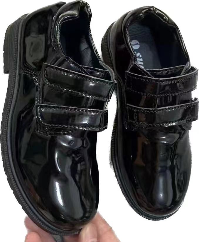 Stockpapa moda niño zapatos de cuero negro ropa stock